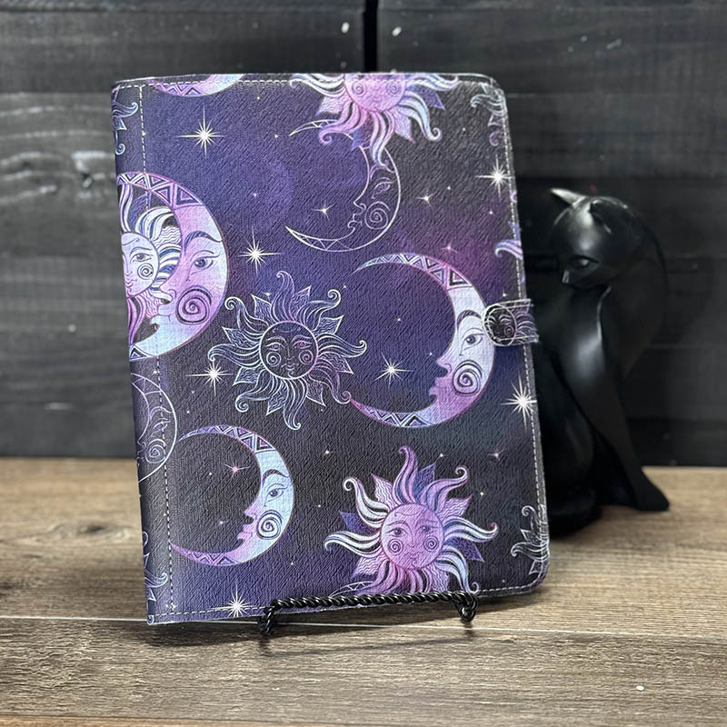 notepad holder featuring a purple and blue celestial design