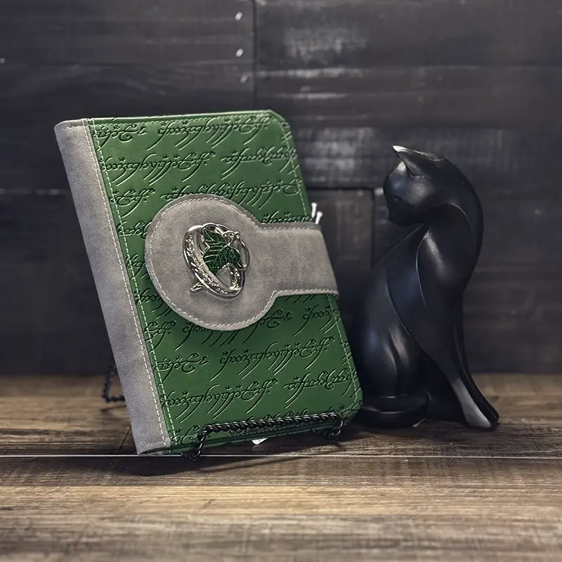 an ebook cover with embossed green vinyl and a leaf magned closure