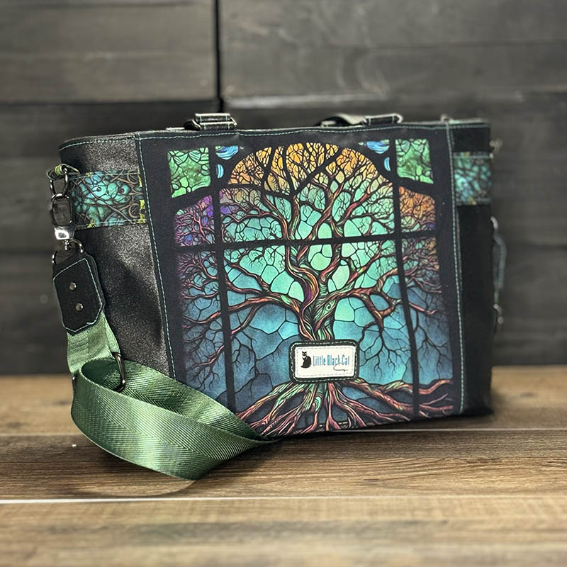 handmade tote bag with a colorful stained glass tree design